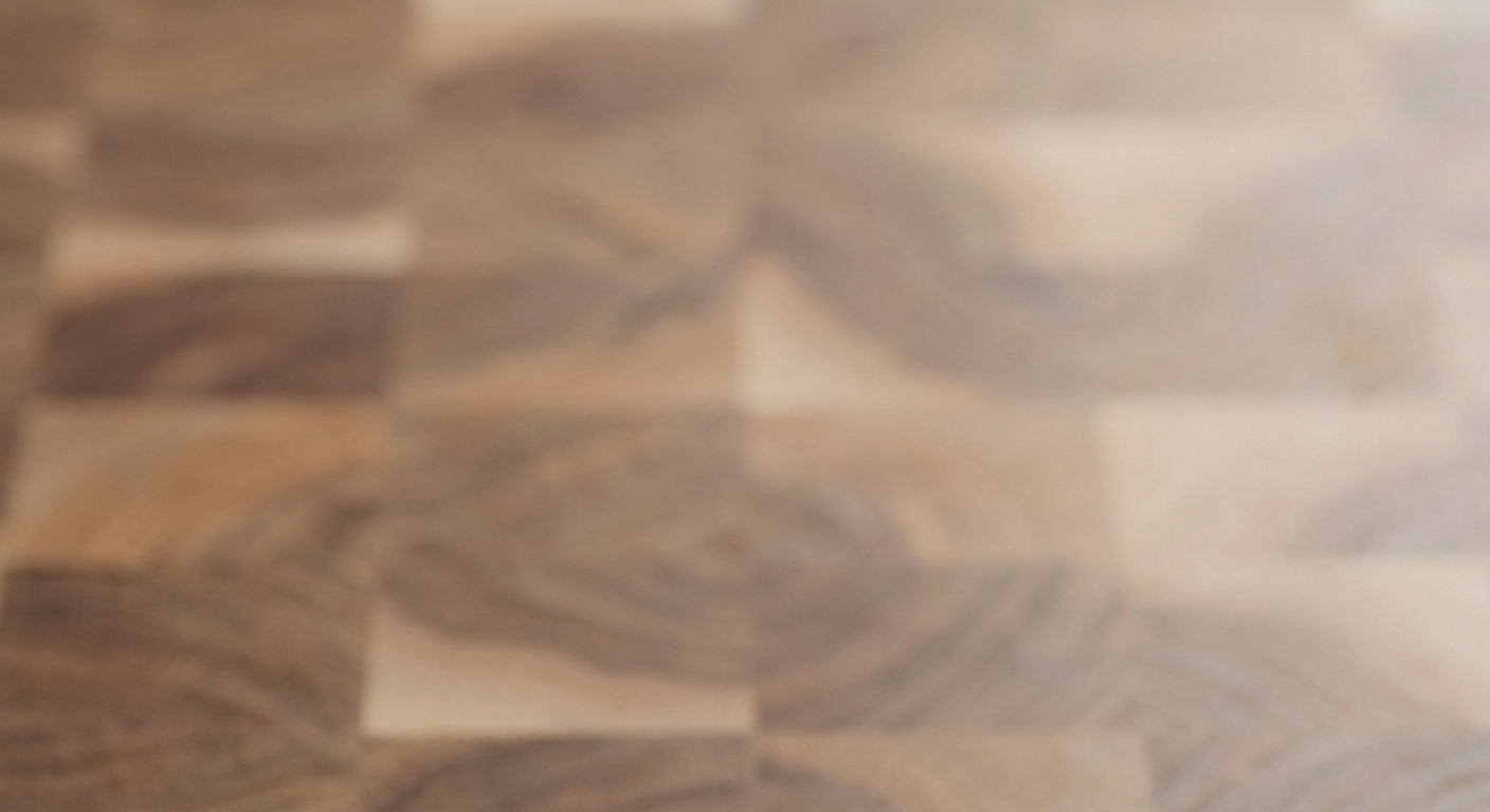 Soft macro detail of end-grain hardwood in muted warm tones